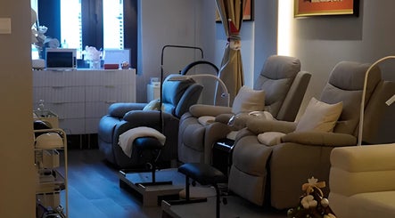 Luxurious lounge chairs at Reyouth Skin Beauty Care, Singapore, Singapore, SG, offering premium relaxation.