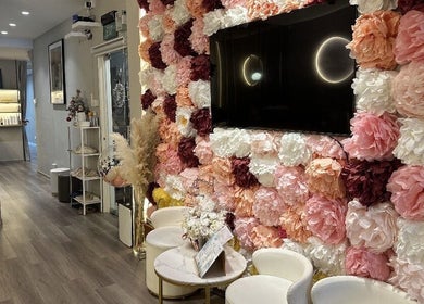 Floral wall at Reyouth Skin Beauty Care in Singapore, SG, creating a serene and inviting ambience.