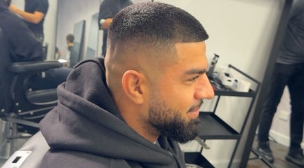 Fresh haircut at Studio M Barbers in Melbourne, Victoria, AU, showcasing professional grooming services.