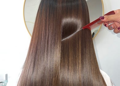 Smooth, shiny hair showcased at KeratinbyYing @apt.hair in Richmond, Victoria, AU. Expert styling in progress.