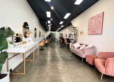 Elegant and modern interior of Keratin by Ying at Apt Hair, Richmond, Victoria, AU with stylish seating.