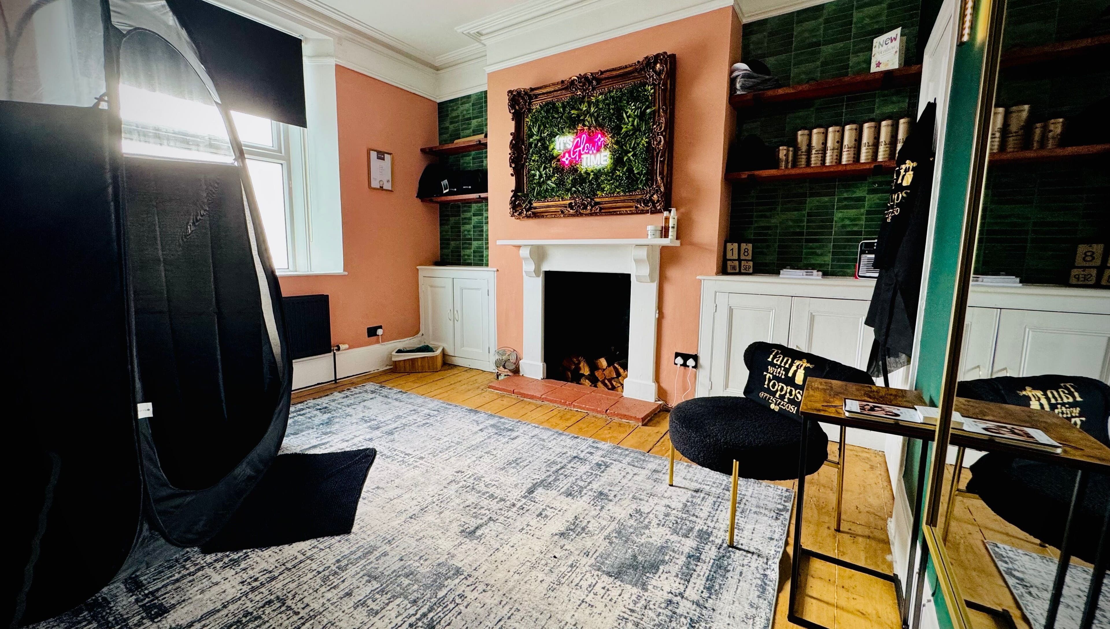 Elegant tanning room at Tan with Topps, Torquay, England, GB showcasing luxurious decor.