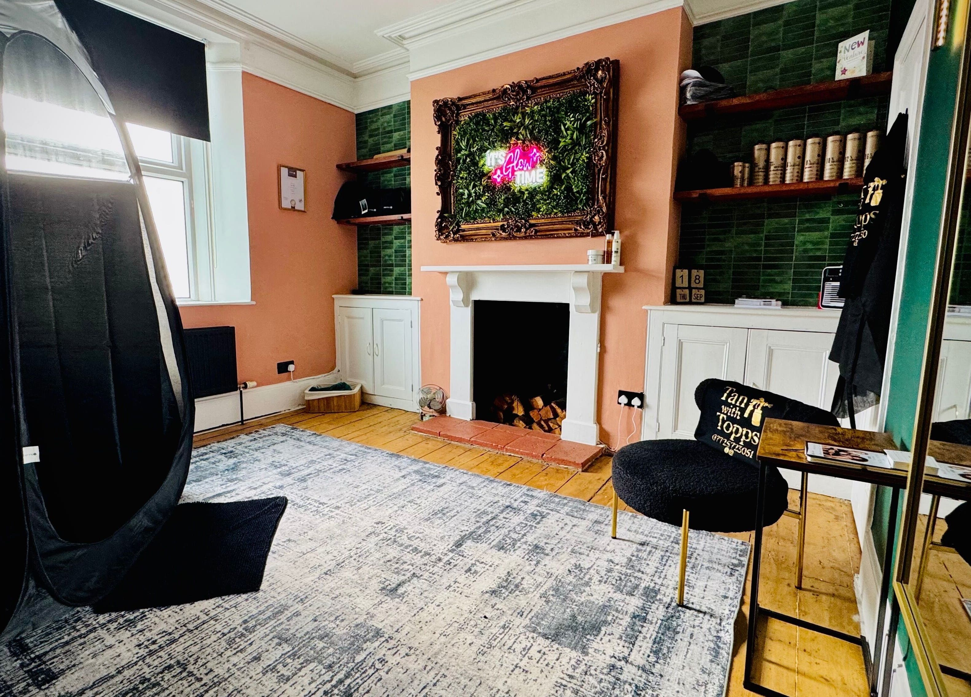 Elegant tanning room at Tan with Topps, Torquay, England, GB showcasing luxurious decor.