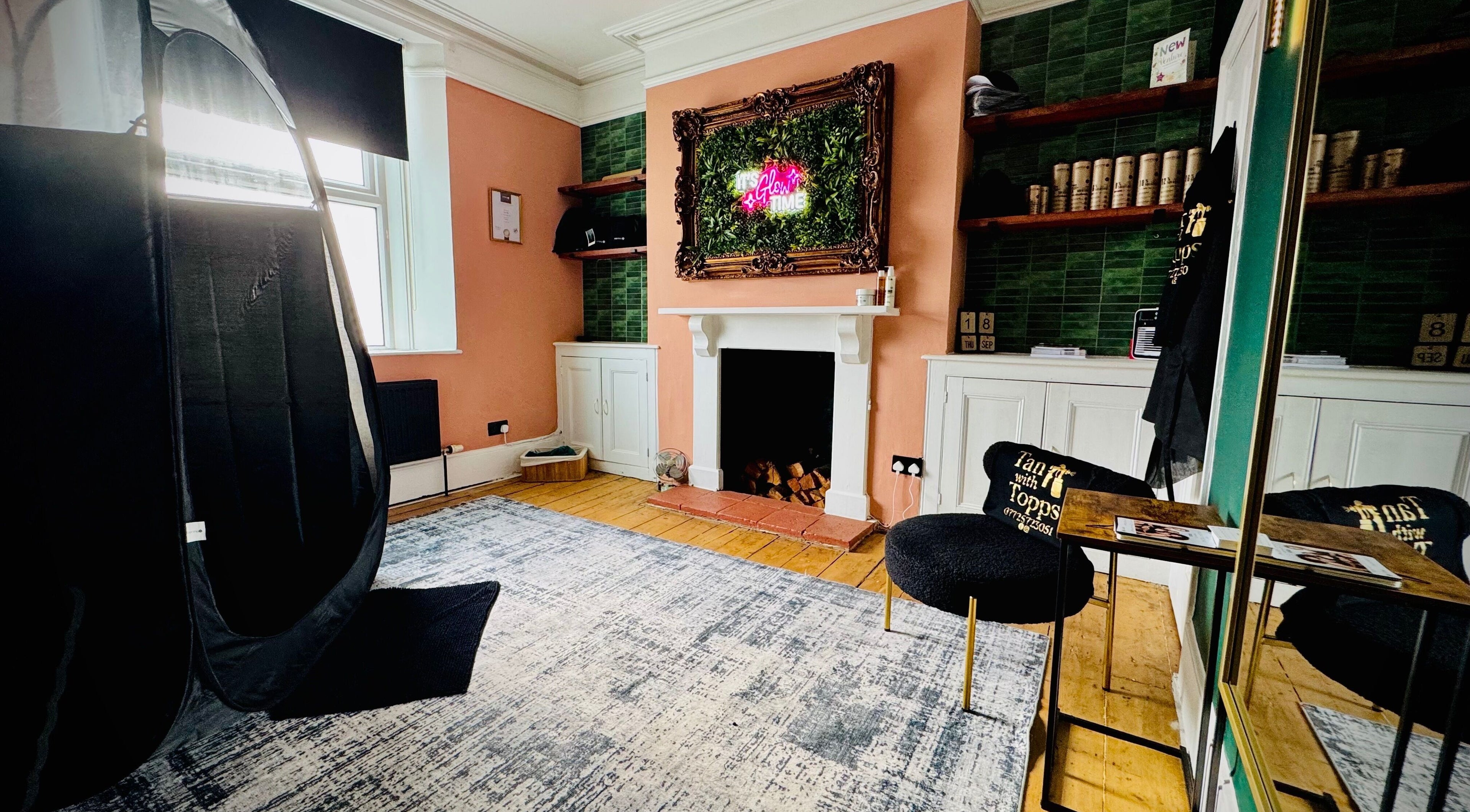 Chic tanning space at Tan with Topps, Torquay, England, GB showcasing a modern setup and stylish decor.