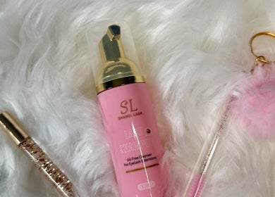 Lash shampoo and accessories from E.loubeauty, Poole, England, GB on soft white fur.