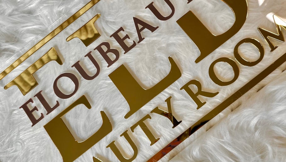 Elegant E.loubeauty logo in gold on soft white background, Poole, England, GB.