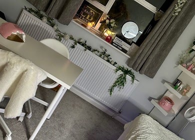 Cozy treatment room at E.loubeauty, Poole, England, GB, with chic decor and relaxing ambiance.