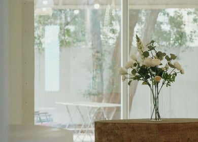 Elegant floral arrangement on table at Mahshid hair club, Muscat, Muscat Governorate, OM.