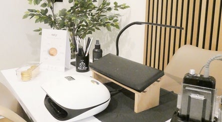 Nail station setup at Nails By Mali in Llandybie, Wales, GB, showcasing tools and decor.