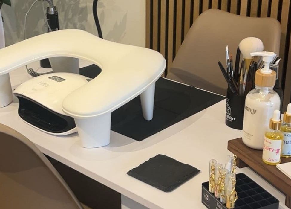 Comfortable nail salon setup at Nails By Mali, Llandybie, Wales, GB with manicure tools and products.