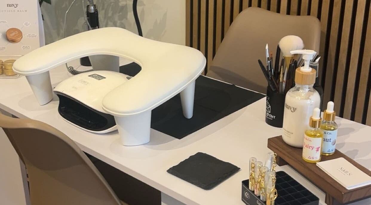 Comfortable nail salon setup at Nails By Mali, Llandybie, Wales, GB with manicure tools and products.