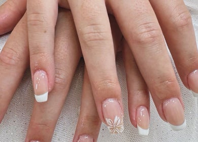 French manicure with flower design at Beauty Point GC, Robina, Queensland, AU.