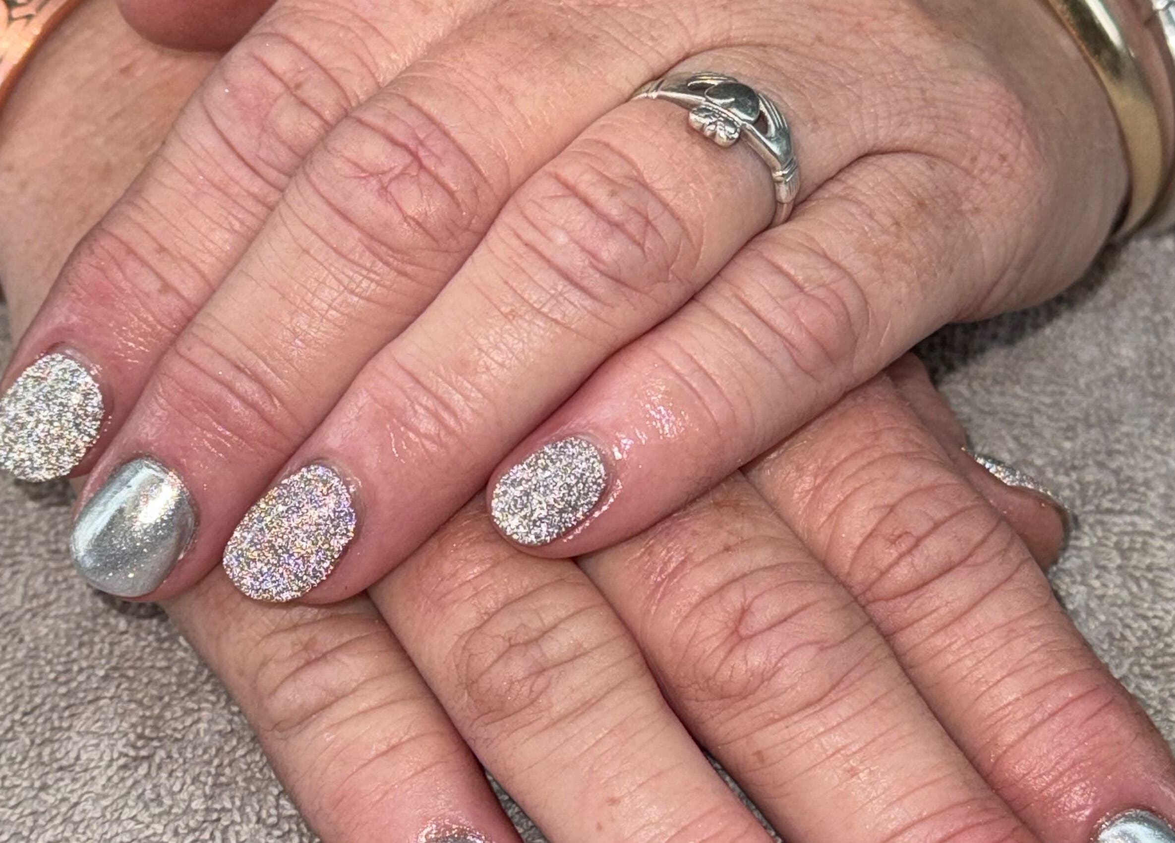 Glittery nail art at Ethereal Nails, Eyrewell Forest, Canterbury Region, NZ, showcasing chic sophistication.