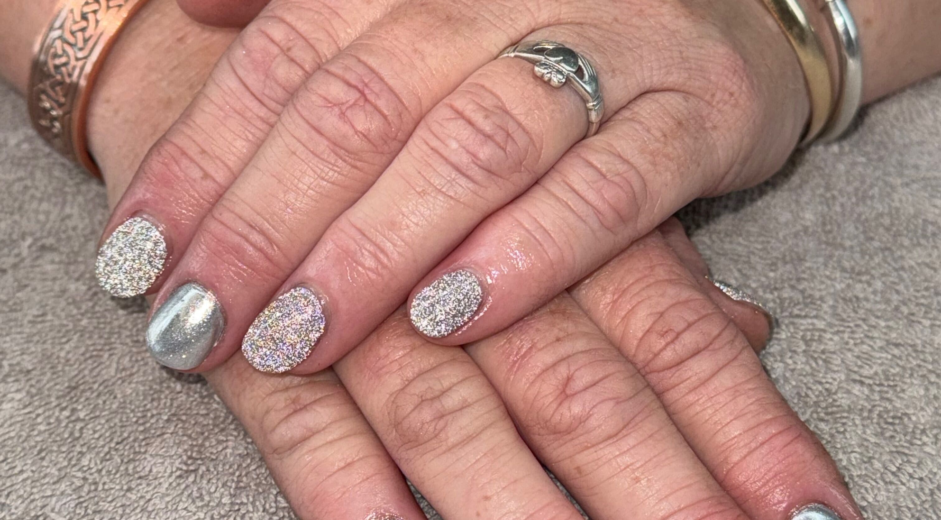 Glittery nail art at Ethereal Nails, Eyrewell Forest, Canterbury Region, NZ, showcasing chic sophistication.