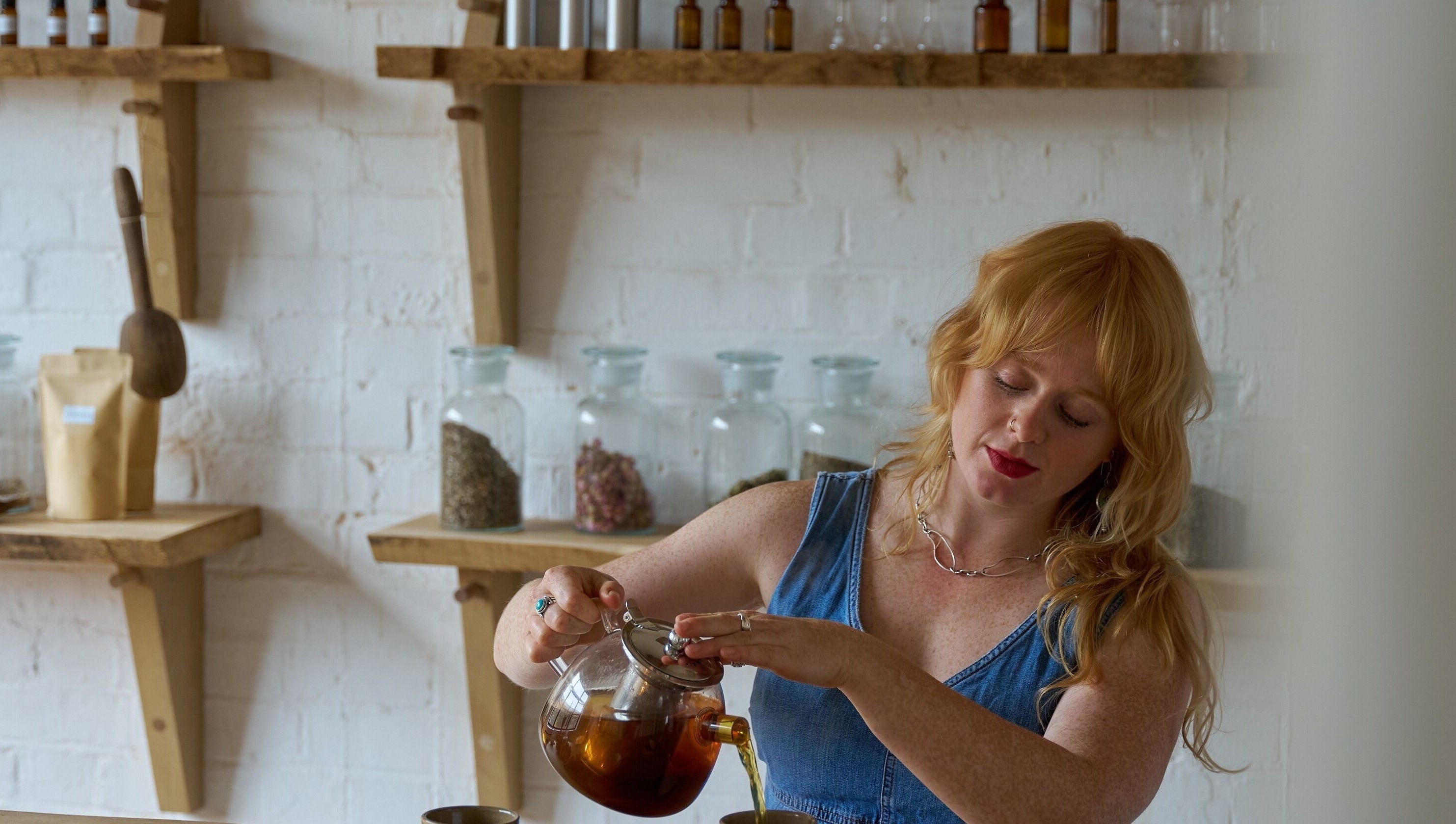 Cassie Adams Acupuncture at In Our Neighbourhood Apothecary, London, England, GB, featuring herbal tea preparation.