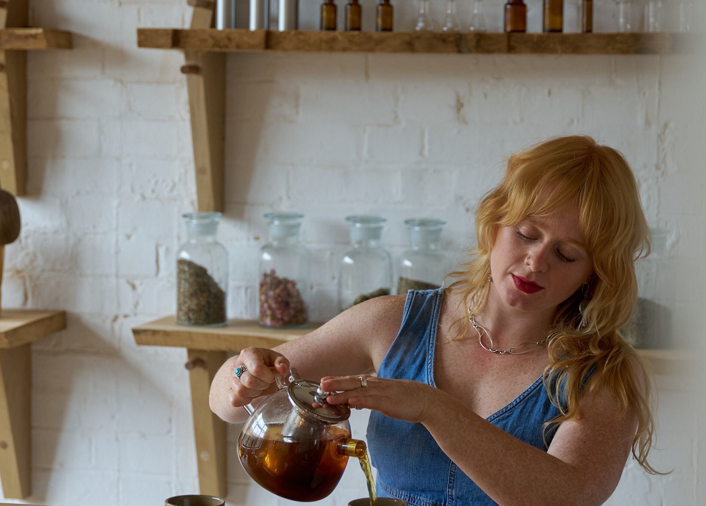 Cassie Adams Acupuncture at In Our Neighbourhood Apothecary, London, England, GB, featuring herbal tea preparation.