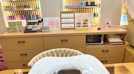 Nail table setup at Yie Academy & Nail Studio in Bali, Bali, ID showcasing polish and tools.