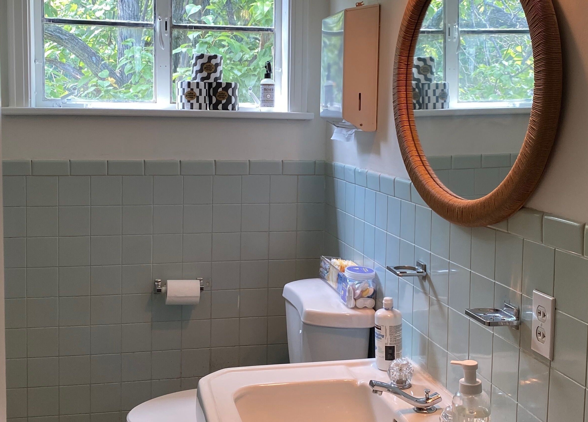Elegant restroom at Zephyr Massage and Bodywork in North Little Rock, Arkansas, US featuring soft pastel tiles.