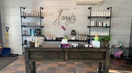 Reception area of Black Diamond Hair Salon in Churchbridge, Saskatchewan, CA showcasing product shelves and decor.