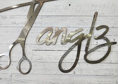 Metal scissors and script art at Black Diamond Hair Salon, Churchbridge, Saskatchewan, CA.