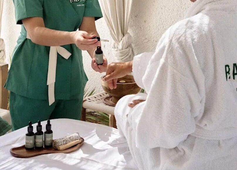 Relaxing home spa treatment at Raaha Wellness - Home Service in Dubai, AE, with essential oils and massage.
