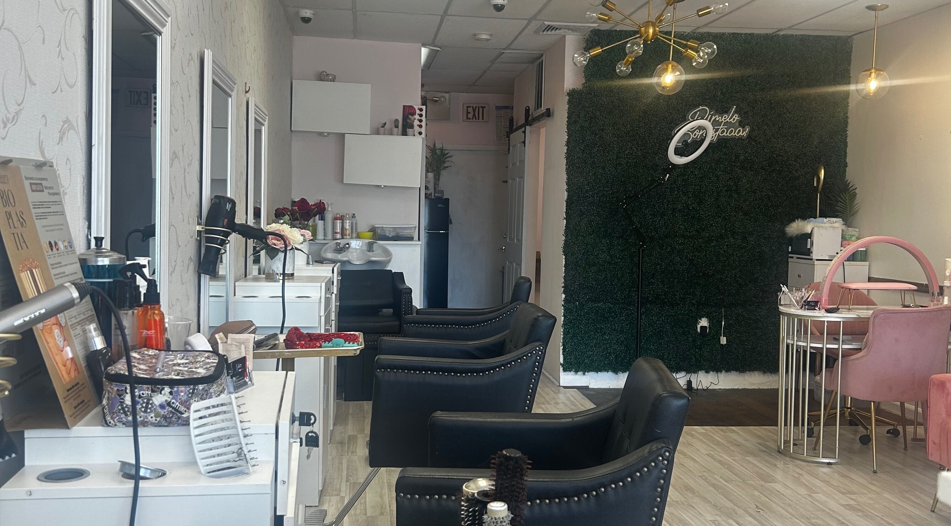 Elegant interior of Estella Dominican Hair Salon in Greenacres, Florida, US with stylish chairs and decor.