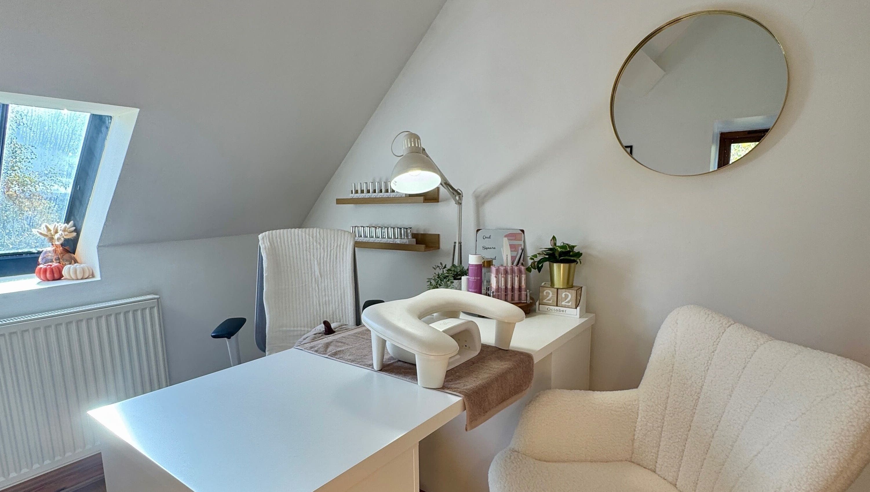 Sophie's Nail Co. cozy workspace in Melin-y-coed, Wales, GB, featuring a chic manicure setup.