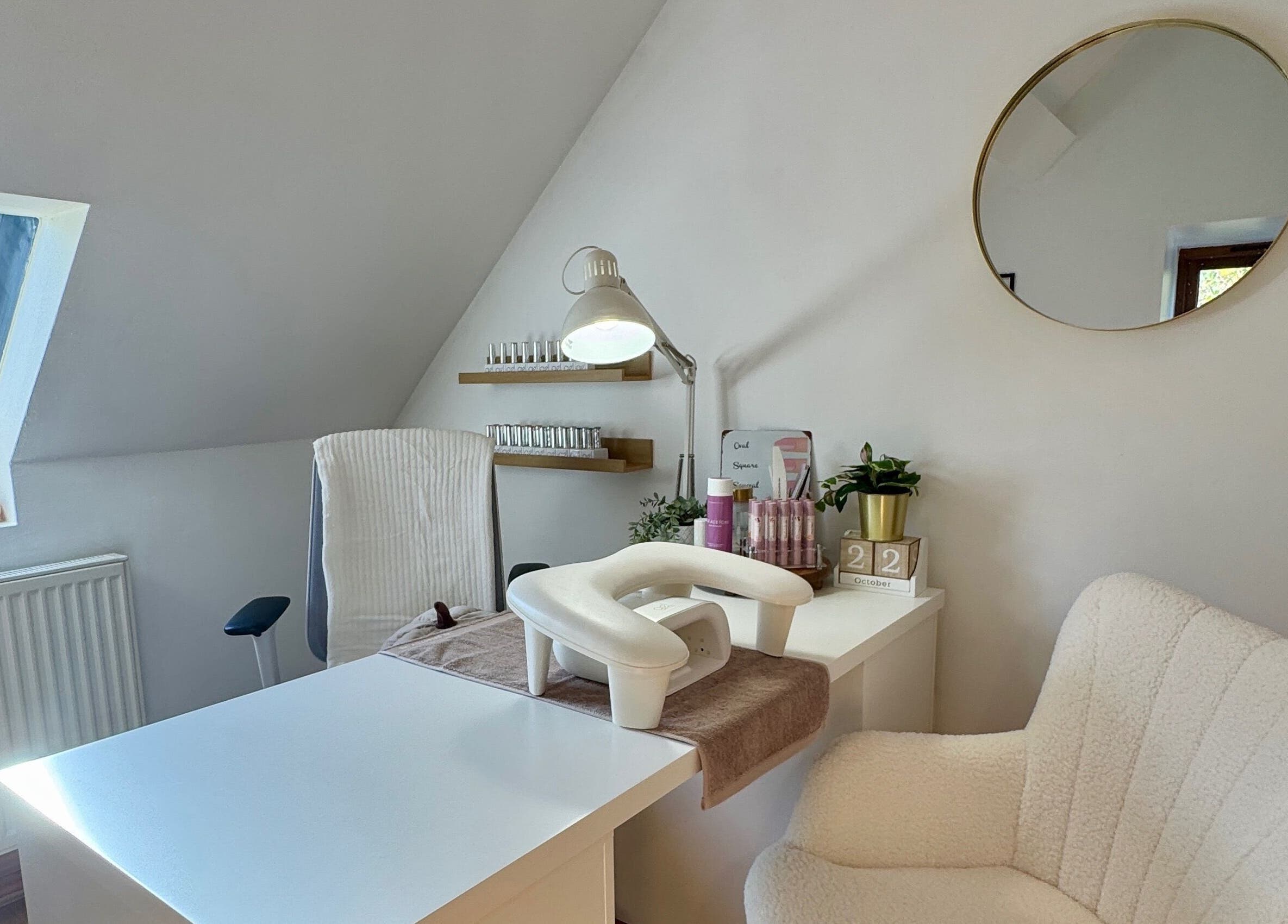 Sophie's Nail Co. cozy workspace in Melin-y-coed, Wales, GB, featuring a chic manicure setup.