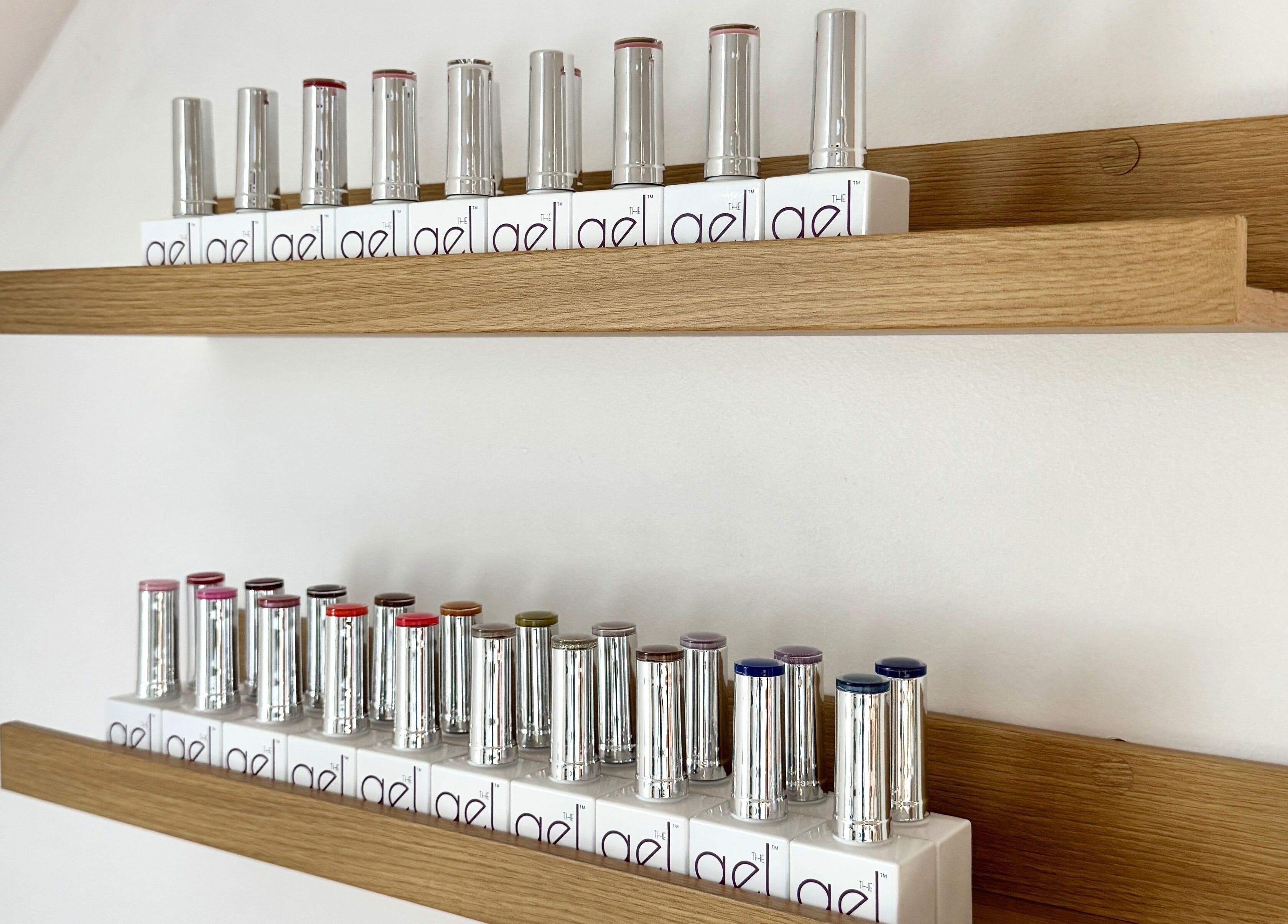 Display of vibrant nail polishes at Sophie’s Nail Co., Melin-y-coed, Wales, GB.