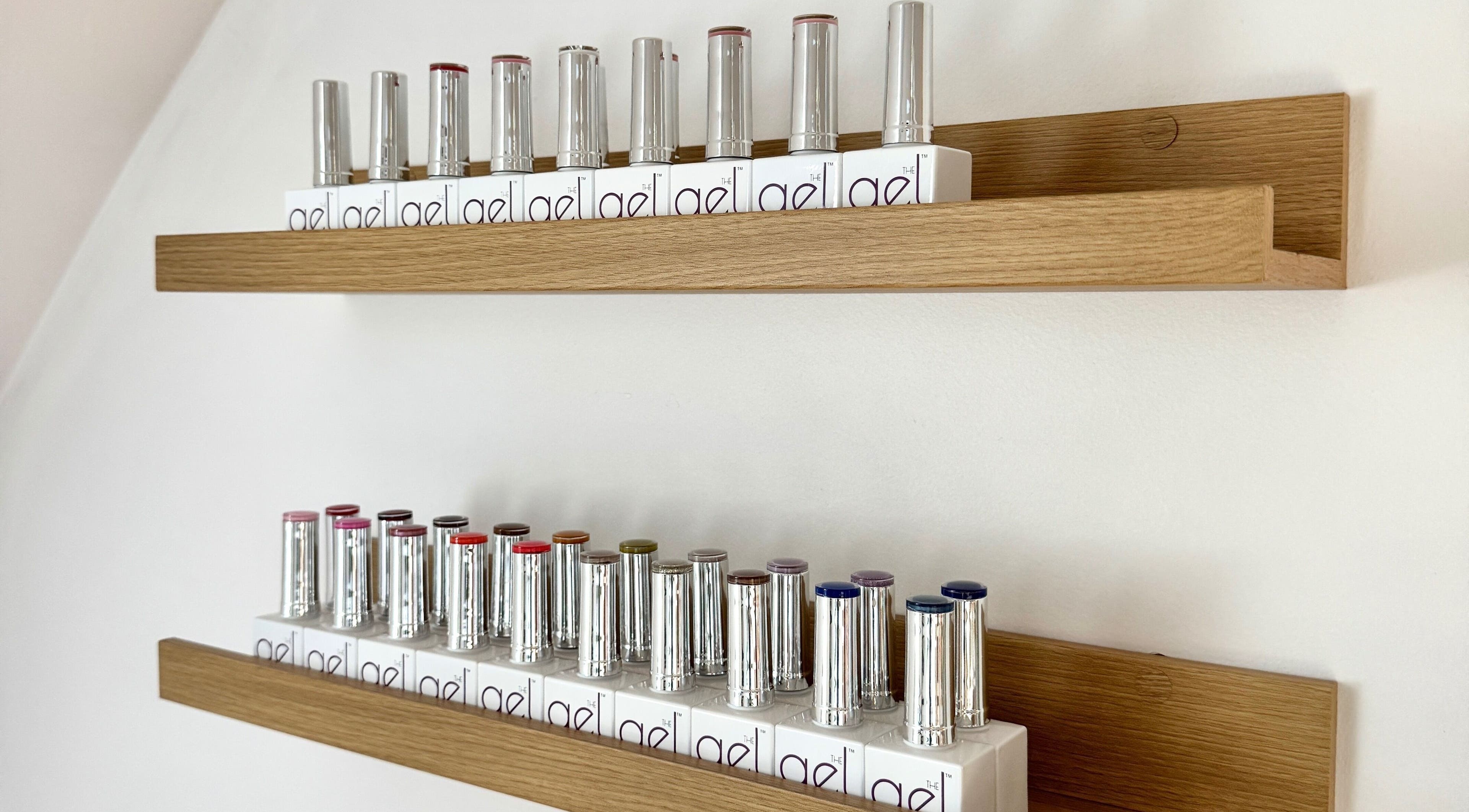 Display of vibrant nail polishes at Sophie’s Nail Co., Melin-y-coed, Wales, GB.