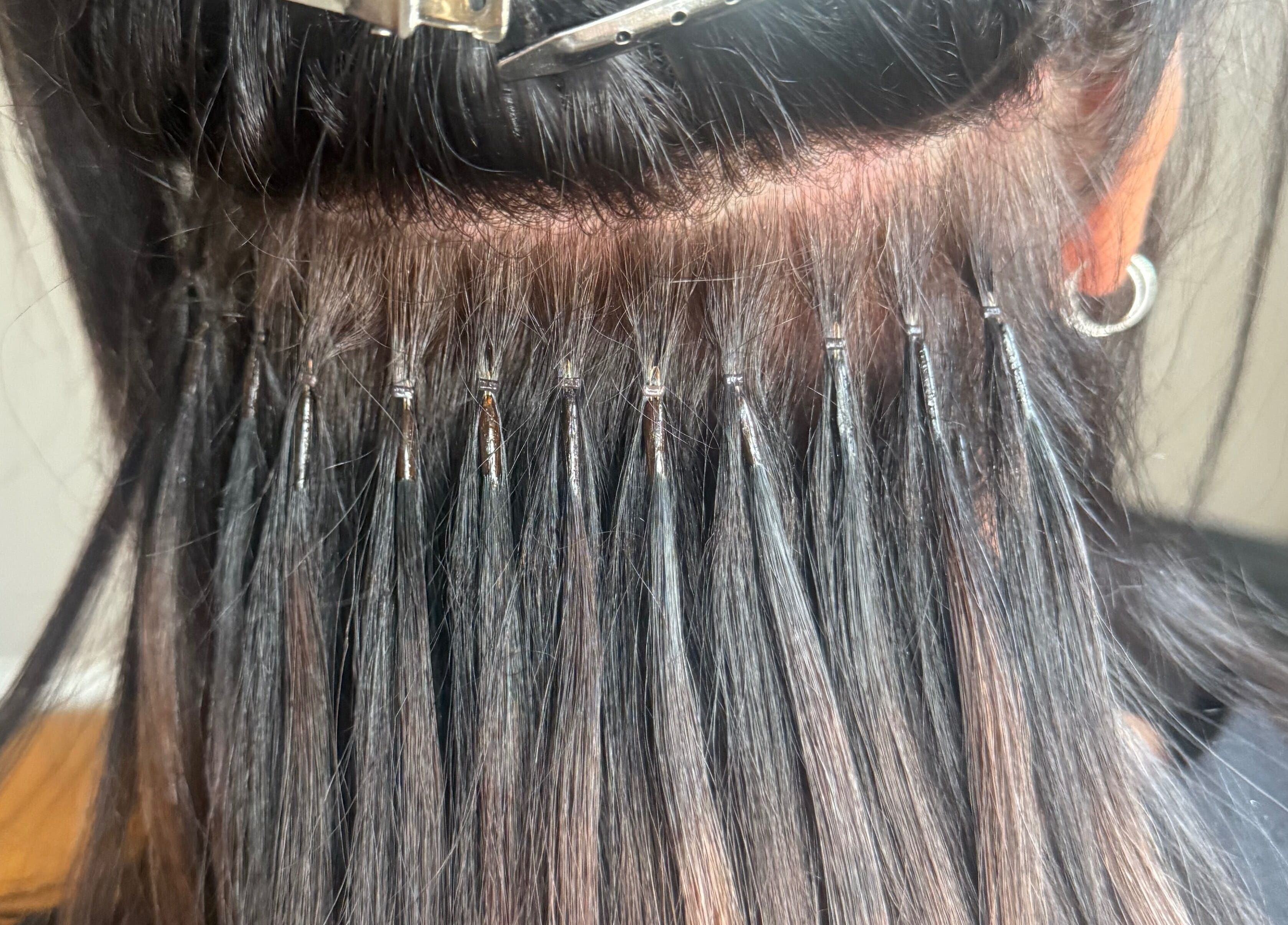 Close-up of Nano extensions by Chantelle in London, Ontario, CA, showcasing detailed hair application.