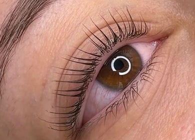 Close-up of perfectly groomed eyelashes at Beauty with CS, Enfield, England, GB.