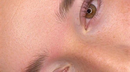 Close-up of an eye and eyebrow at Beauty with CS, Enfield, England, GB, showcasing flawless skin texture.