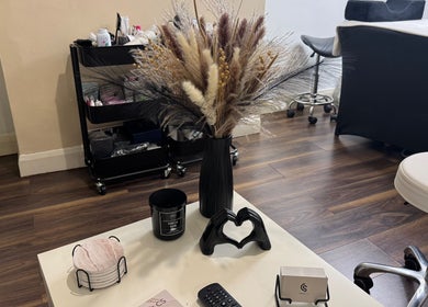 Cozy corner at Beauty with CS, Enfield, England, GB featuring decor and seating for a relaxing ambiance.
