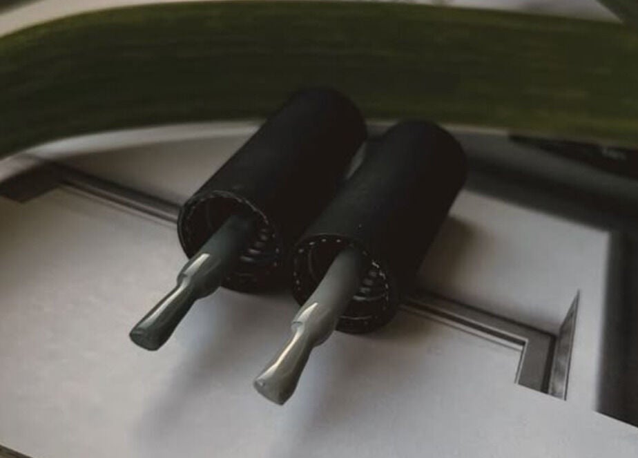 Stylish black nail polish bottles at Elona Botsyan, Federal Way, Washington, US.