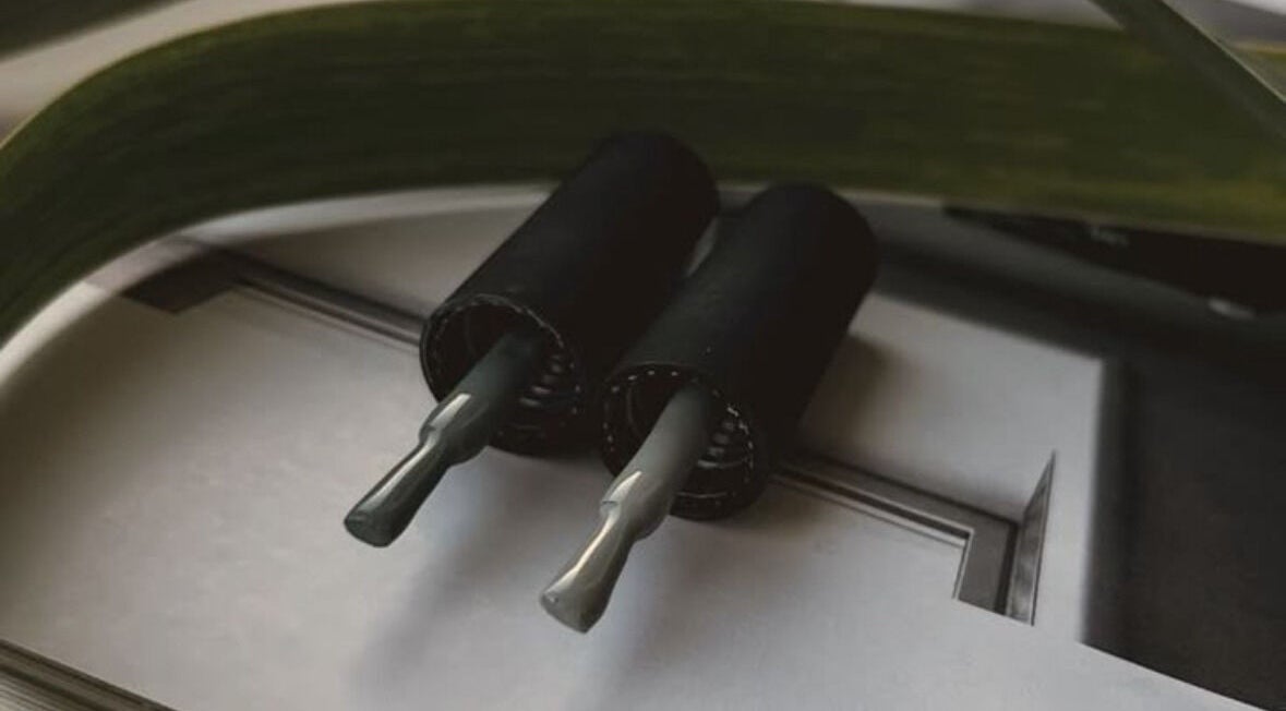 Stylish black nail polish bottles at Elona Botsyan, Federal Way, Washington, US.