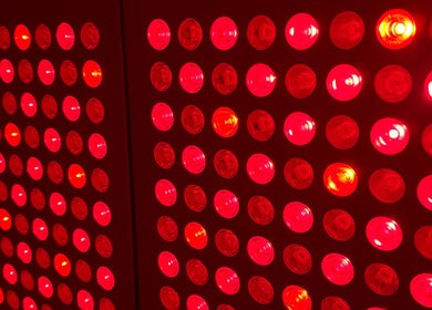 Red light therapy panel at Nella Fusco LMT, CSP in Waterville, Maine, US enhances wellness treatments.