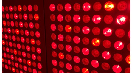Red light therapy panel at Nella Fusco LMT, CSP in Waterville, Maine, US enhances wellness treatments.