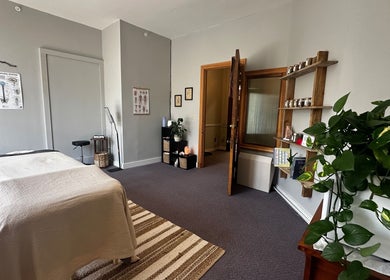 Peaceful massage room at Nella Fusco LMT, CSP, Waterville, Maine, US with massage table and soothing decor.