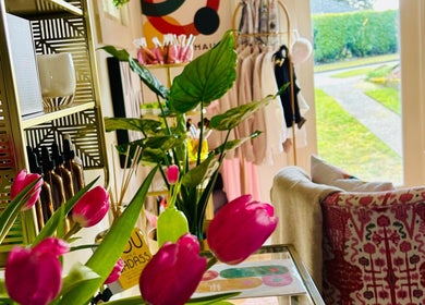 Vibrant tulips and decor at Physiques Boutique in Seattle, Washington, US, creating a serene and stylish ambiance.