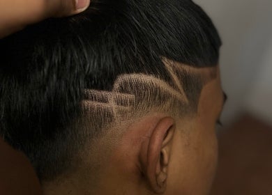 Sleek haircut with geometric design at Bad barberz, Singapore, Singapore, SG.