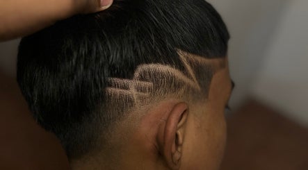 Sleek haircut with geometric design at Bad barberz, Singapore, Singapore, SG.