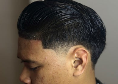 Close-up of a sleek hairstyle at Bad Barberz, Singapore, Singapore, SG, showcasing expert precision.