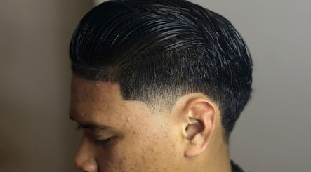 Close-up of a sleek hairstyle at Bad Barberz, Singapore, Singapore, SG, showcasing expert precision.
