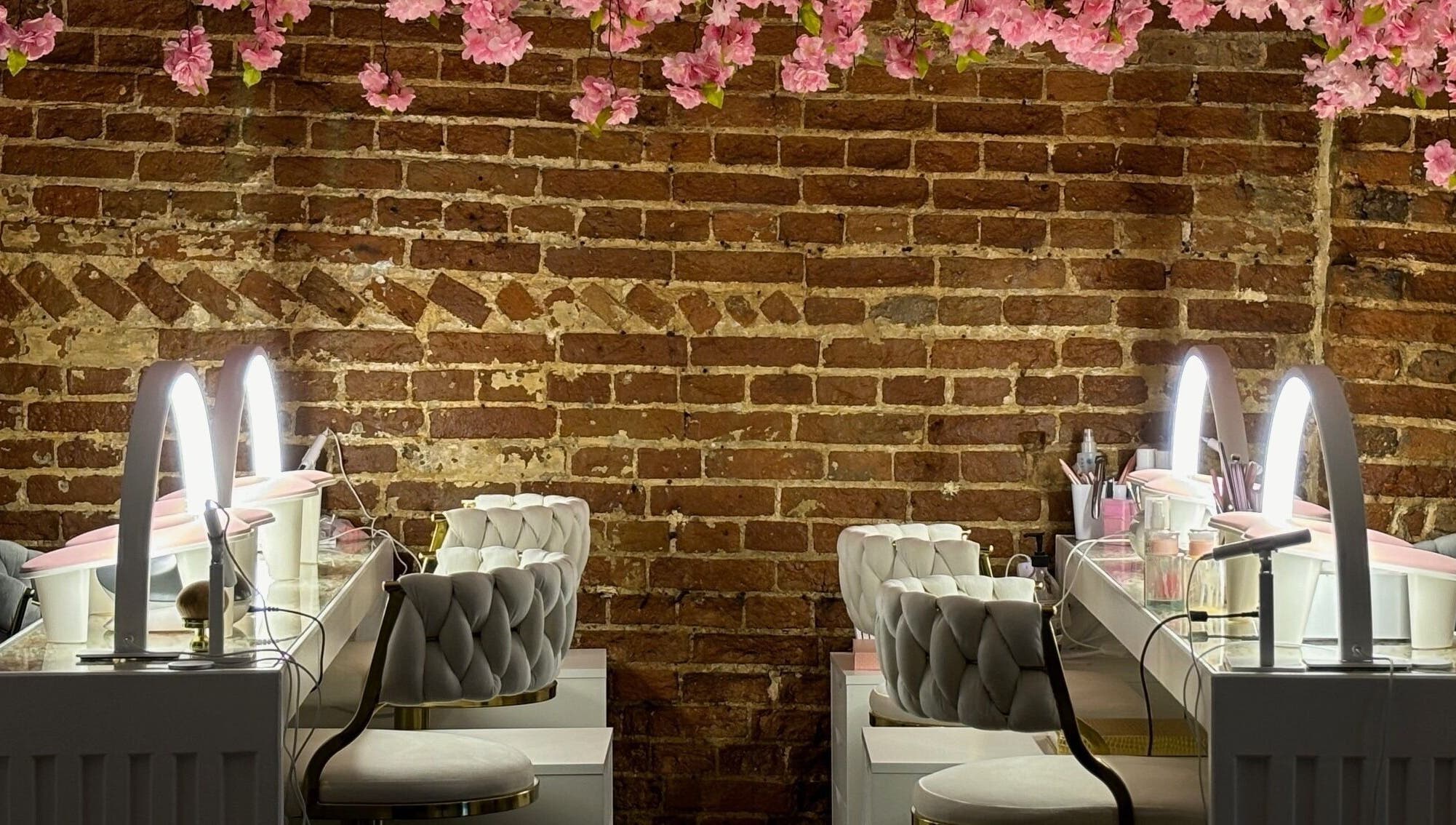 Elegant makeup stations with blossom decor at The Blossom Clinic, Beccles, England, GB.