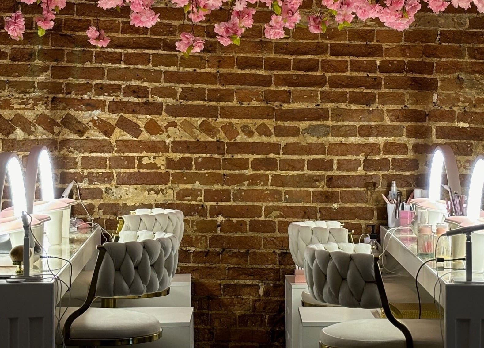 Elegant makeup stations with blossom decor at The Blossom Clinic, Beccles, England, GB.