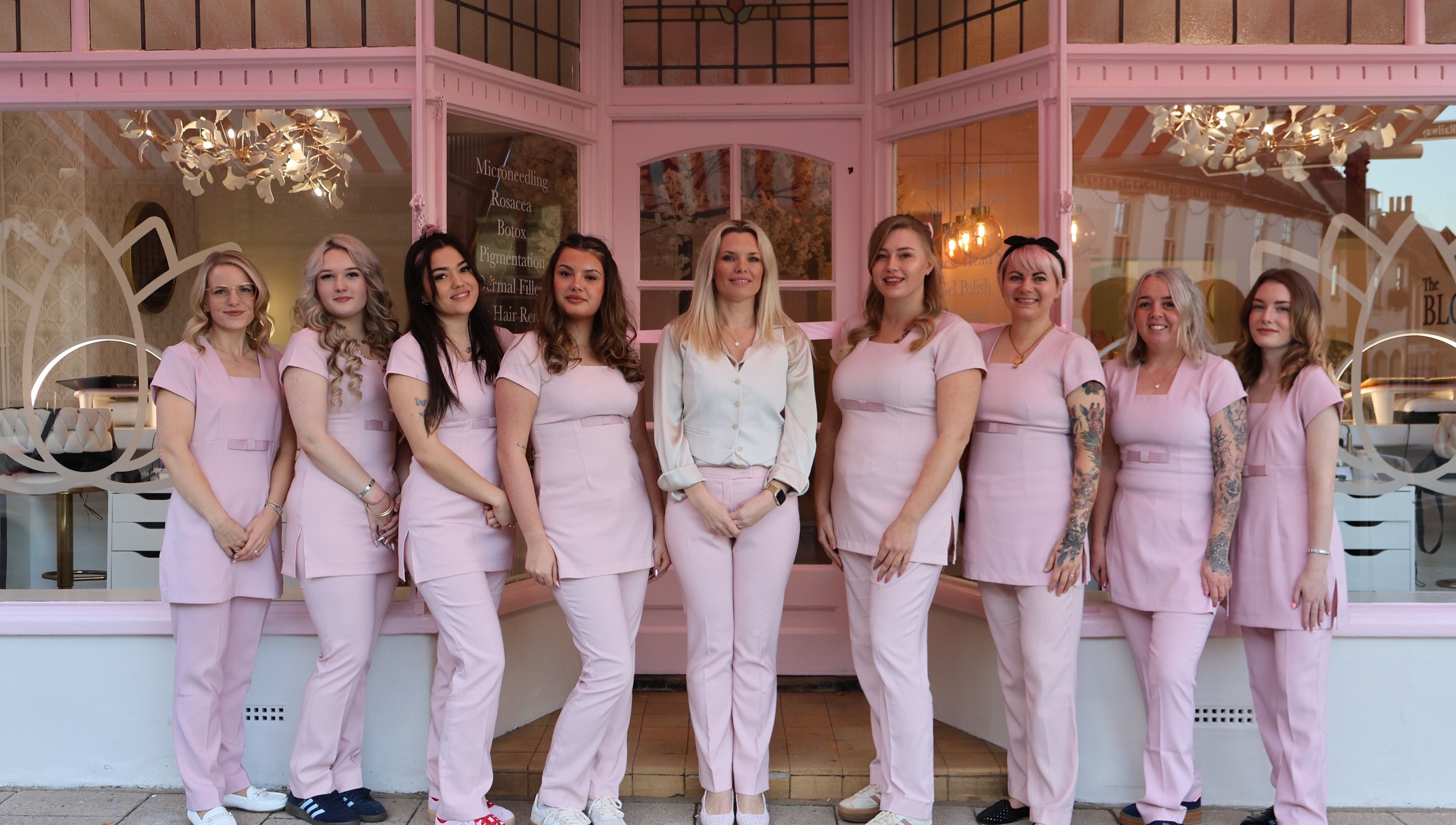 The Blossom Clinic team in pink uniforms, Beccles, England, GB.