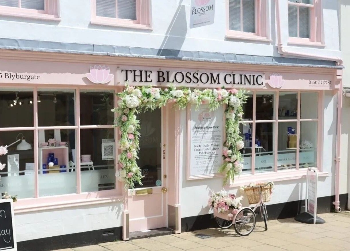 Elegant front of The Blossom Clinic in Beccles, England, GB adorned with floral decor.