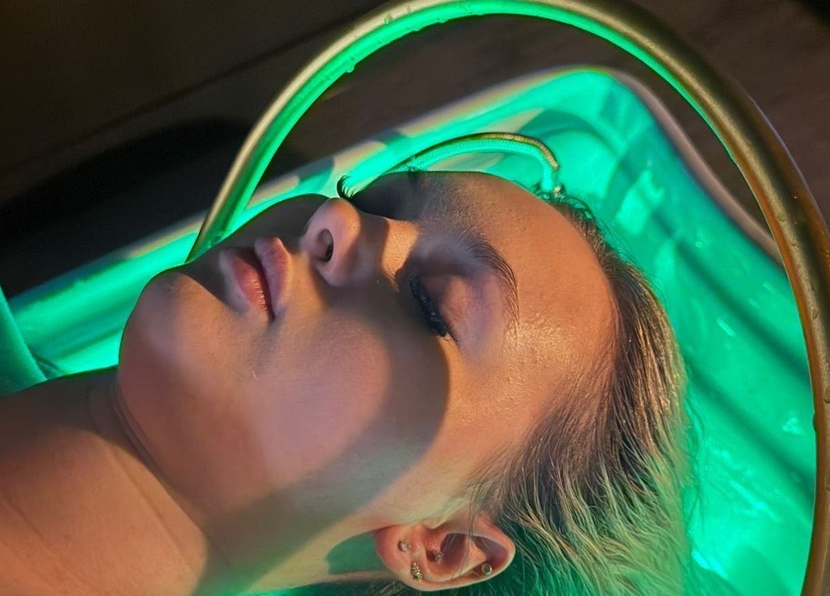 Relaxing facial therapy at The Blossom Clinic, Beccles, England, GB in serene, ambient lighting.