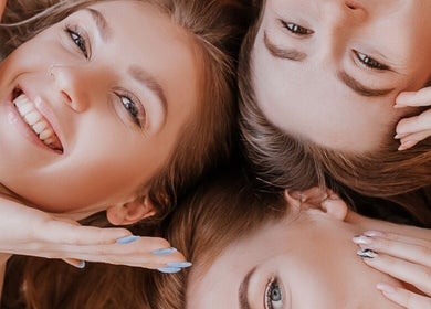 Joyful women relaxing at Casa de luxe, Los Angeles, California, US, showcasing beauty and wellness.